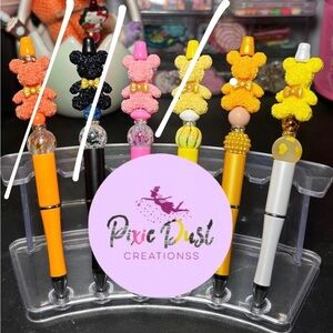 Flower bears focal writing pens